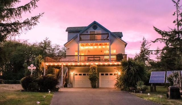 Dog-friendly riverfront retreat with hot tub on 5.2 acres near the beach