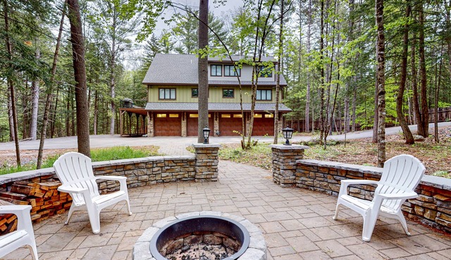 Dog-friendly riverfront retreat with two decks, washer/dryer, Ping-Pong, & AC
