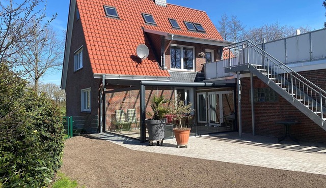 Dog-friendly vacation apartment in East Frisia with fenced garden