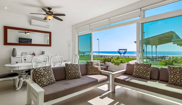 Dog-friendly villa with beach views, patio, outdoor pool, streaming, partial AC