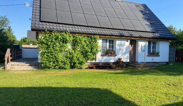 Domek nad jeziorem Bory Tucholskie las jeziora wakacje weekend Błądzim