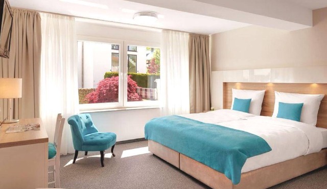 Doppelzimmer Standard Plus mit WC und Dusche