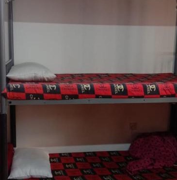 Dormitory bed space in a shared room
