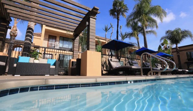 Double Queen Room, The Cove Hotel, Poolside Luxury and Outdoor Fireplace