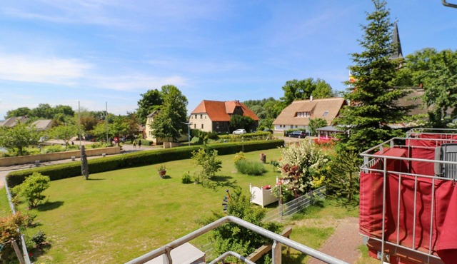 Double room with balcony and Bodden view directly at the harbor of Wustrow