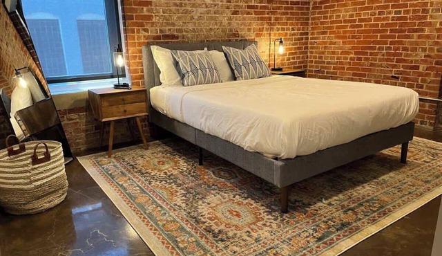 Downtown 2BR w/exposed brick charm