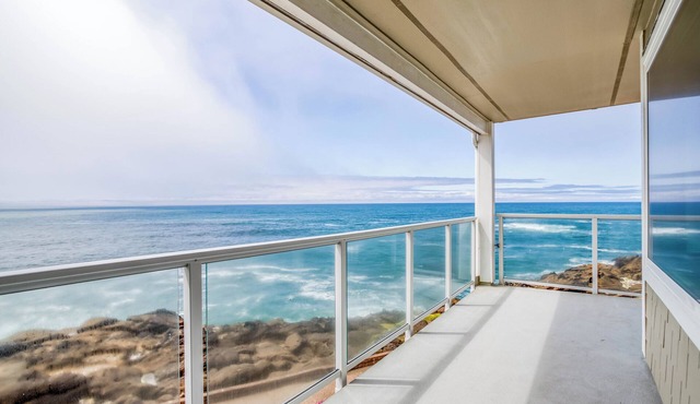 Dramatic Clifftop Depoe Bay Oceanfront Condo has Whales, Birds, and a King Suite