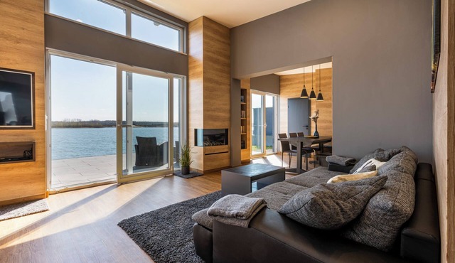 Dream house/private beach 120m², sauna, air conditioning,terrace,garden,barbecue,boat