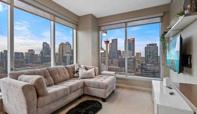 DT Views | Walk to Saddledome| 2BR | UG Parking|AC