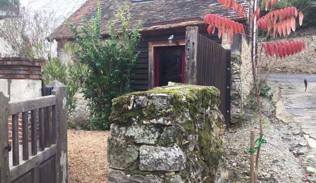 Duplex studio with small garden at the foot of the château
