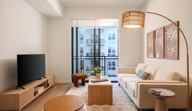 Edgewater Luxury 2BR Suite w/Balcony | Pool + Gym | Sense 28 by AvantStay