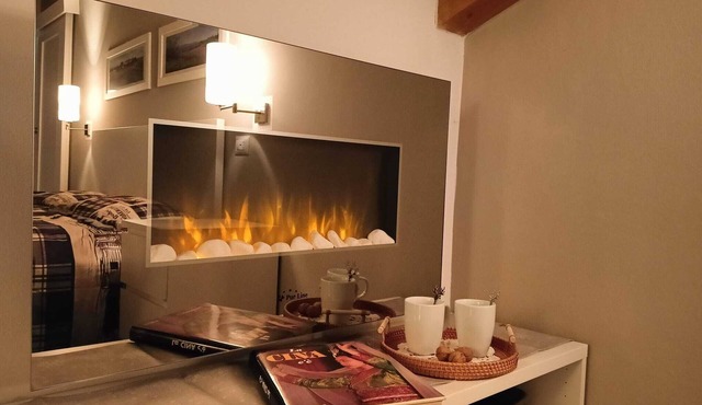 Elegant attic with Dolomites view, relaxation and nature in Levico Terme.
