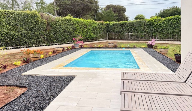 Elegant Home with Pool and within 10 mins to beach, Airport, and Dining