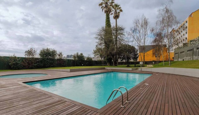 Elegant Riverfront Flat | Pool & Sports by HostWise