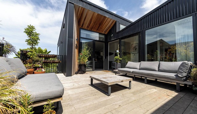 Elevated Architectural Home With Sea And Garden Views In St Clair