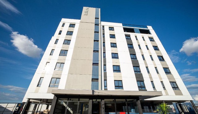 ELLEVA STUDIOS | Studio moderno com coworking e rooftop em Sinop