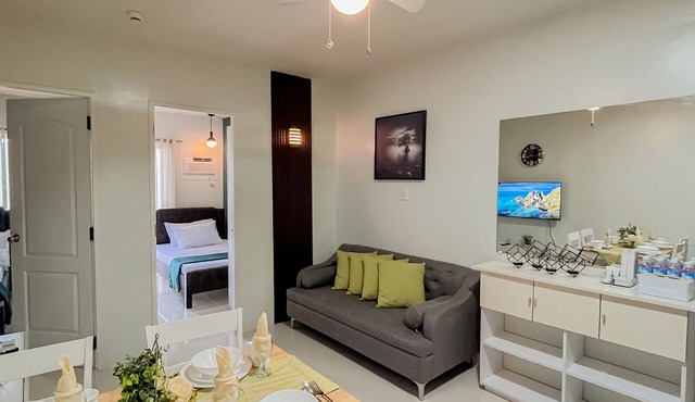 Emerald 2 bedroom apartment with a pool, gym, and a balcony with a view