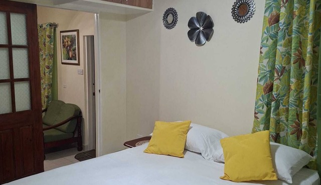 Emerald Haven 1-bedroom apartment with AC designed for comfort & convenience