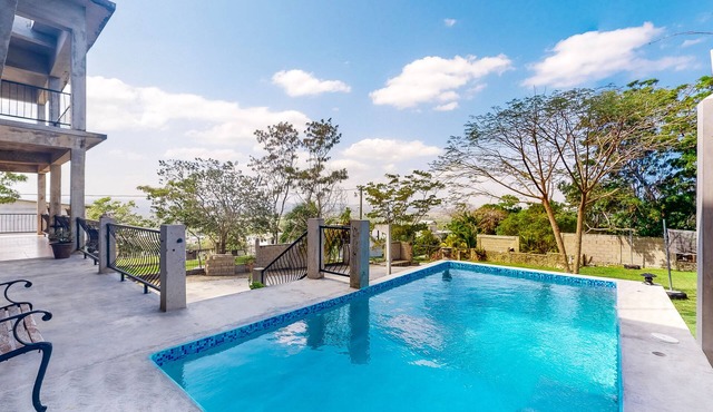Enchanting home with pool, volleyball, mountain/city views & AC
