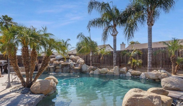 Enjoy a Mini Oasis w/Pool Waterfall 4bd/2ba Home!