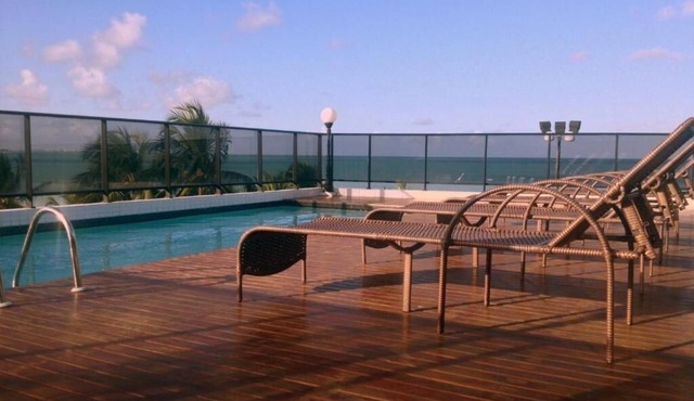 Enjoy Beachfront Bliss at Family Suite Near Tambau Beach - Free Breakfast!