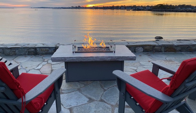 Enjoy endless harbor activity and waterfront sunsets over NYC skyline