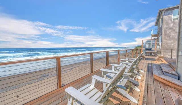 Enjoy the beach from this Ocean Front home with a Hot Tub and Large Deck