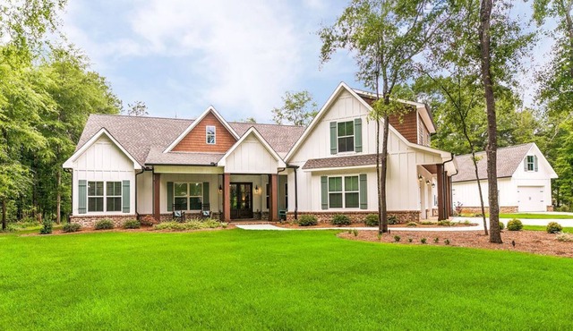 Enjoy this large southern dream home on beautiful lot with Pecan trees.
