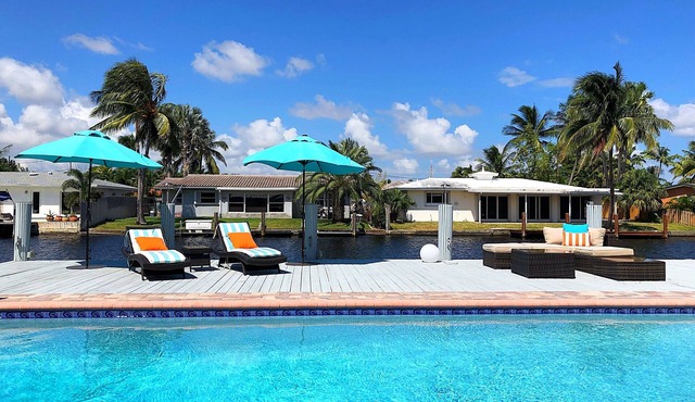 Entire Waterfront Home with Heated Pool, Dock & Sunset Views