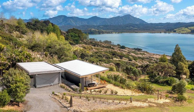 Escape to a private retreat in natures embrace on the tranquil Hokianga Harbour