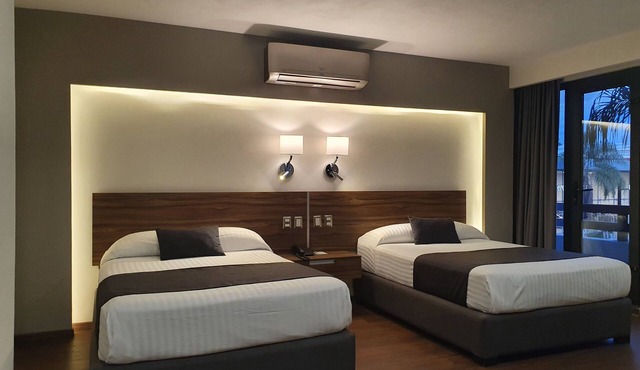 Estanza Hotel & Suites