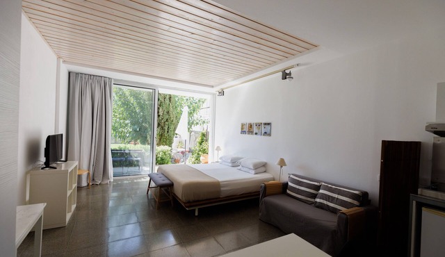 Eupnea | Studio Apartment, Art by PraXis Apartments