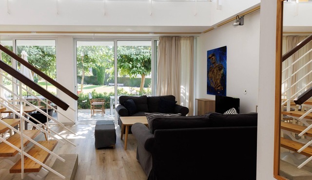 Eupraxia | Three-Bedroom Apartment, Art by PraXis Apartments