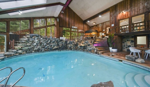 Events Welcome! Exclusive 65-Acre Gated Estate w/Indoor Pool & Private Lake