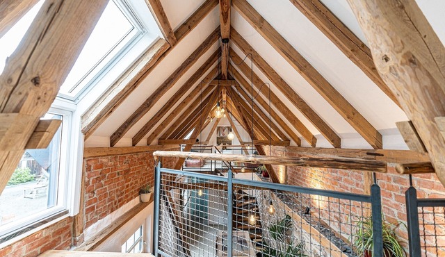 Exceptional barn loft with open roof truss