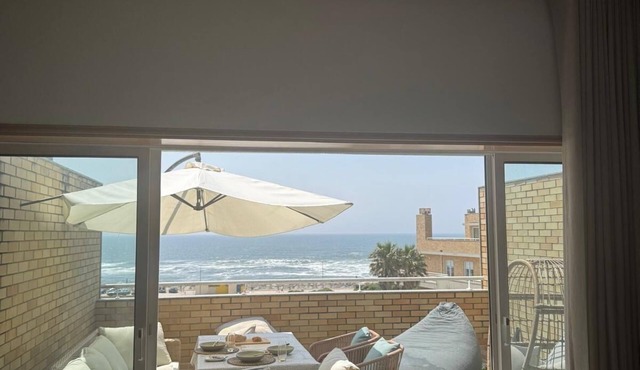EXCLUSIVE BEACHFRONT APARTMENT