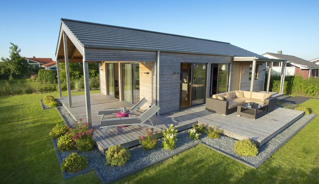 Exclusive design holiday home made of healthy natural materials with top equipment