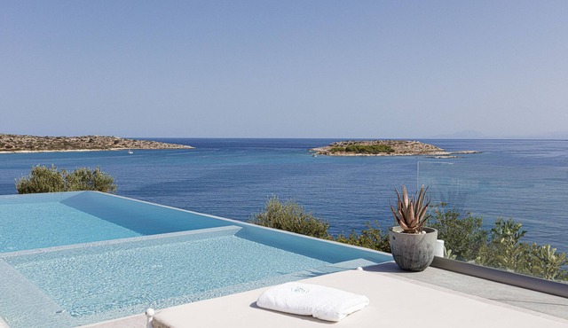 Exclusive seafront escape with heated infinity pool, hot tub and sea views