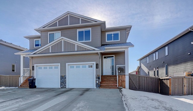 Executive style 4-plex unit is located in Whispering Ridge.