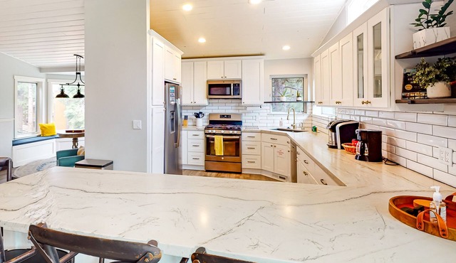 Expansive Mountain-View Gem on Serene Half-Acre | Near Skiing, Golf & Beaches