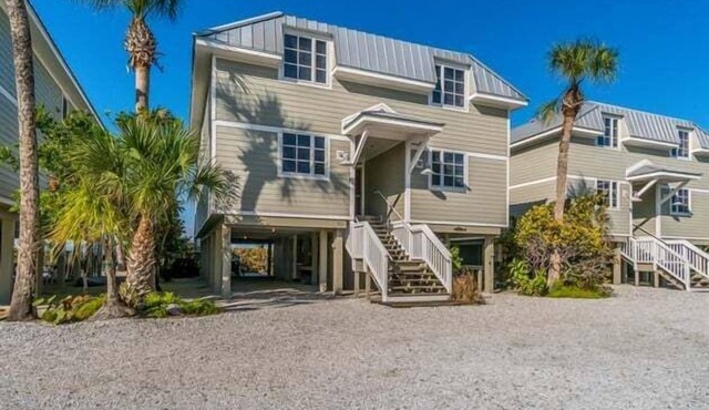 Experience beachfront luxury in this 3-bedroom, 2-bathroom townhome in Boca Grande.
