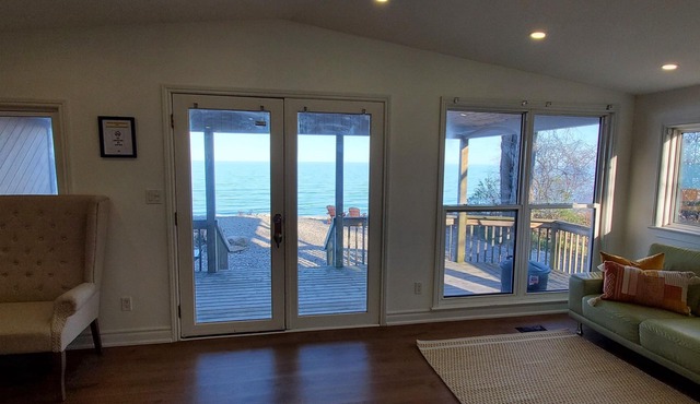 Experience Blissful Lakeside Living: Retreat with Stunning Views, Beach Access
