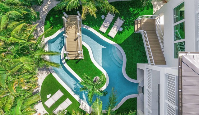 Experience Luxury at Go with the Flow! Lazy River Pool, Rooftop Deck and Games!