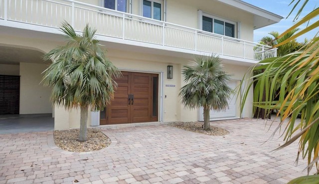 Experience luxury at Casa De Bliss, a spacious 4-bedroom canalfront retreat in Islamorada.