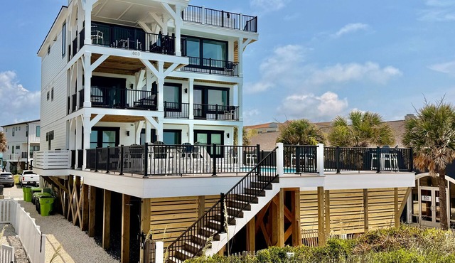 Experience luxury at 'How Suite It Is'—14-bedroom oceanfront retreat in Oak Island!