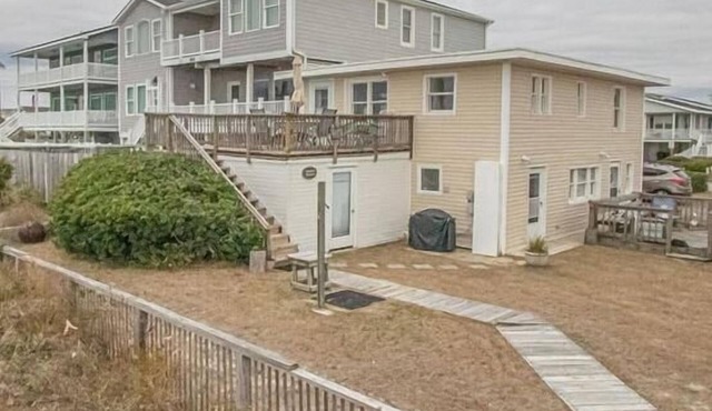 Experience oceanfront bliss at The Captain's Quarters, Holden Beach!