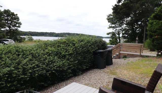 Experience relaxation at Dennis CapeCodProperty 183, a cozy 2B cottage overlooking Follins Pond.
