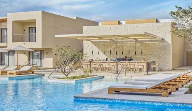 Experience Serenity in Balcony Bedroom with Swimming Pool by Almaza Bay