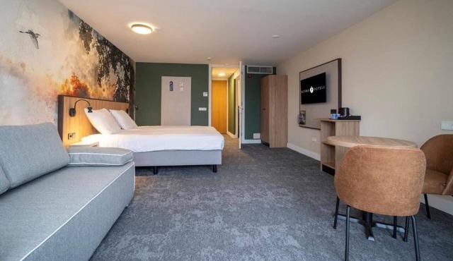 Explore Groningen from a Scenic Room w/Balcony Near Speelgoedmuseum Roden