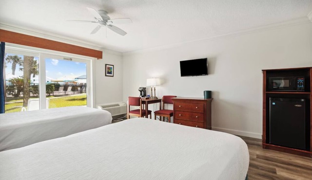 Explore Local Gems from a Relaxing Beachfront Room with Outdoor Swimming Pool